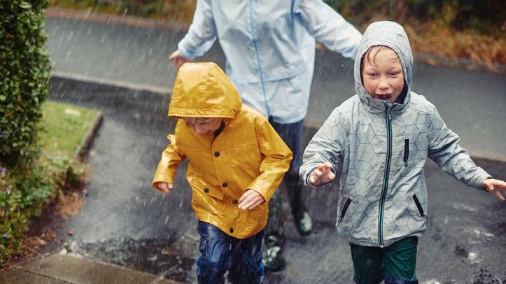 kids running in rain