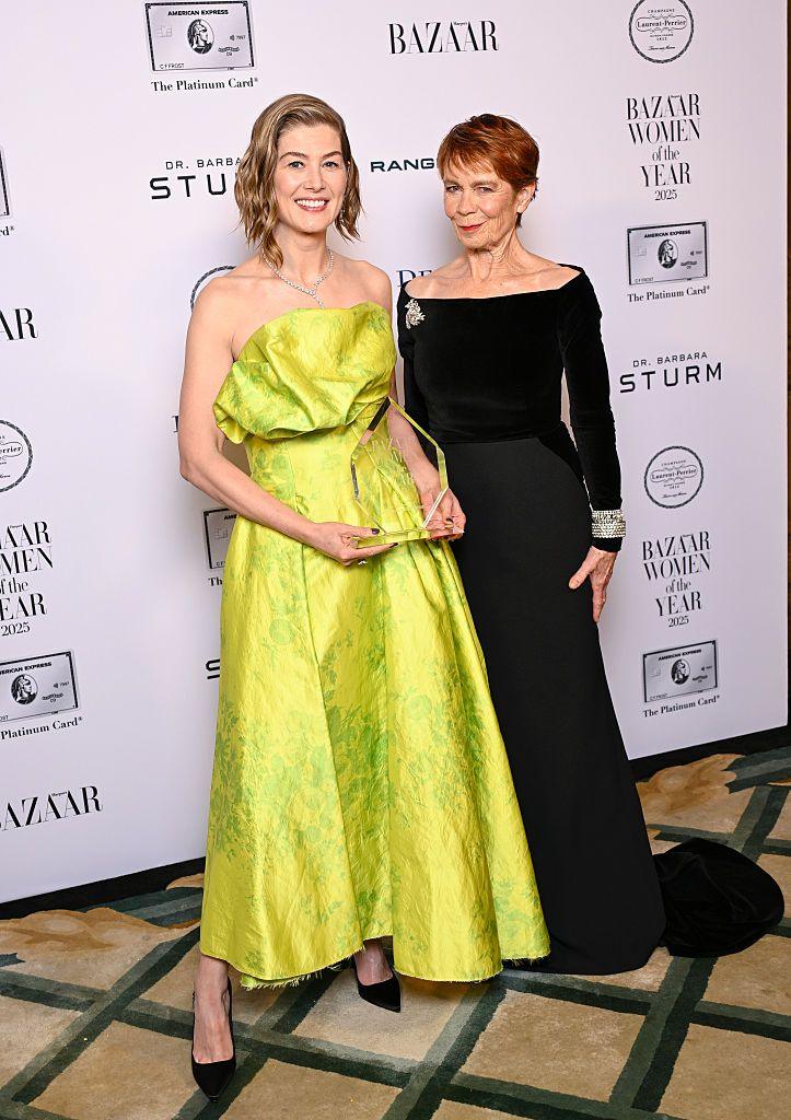 Rosamund Pike, winner of Theatre Actress of The Year Award, poses with Celia Imrie in the Winner's Room during Harper's Bazaar Women Of The Year at Claridges Hotel on November 06, 2025 in London, England.