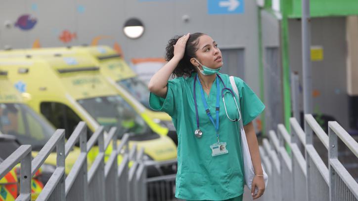 healthcare worker outside a hospital