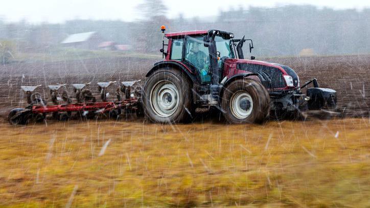 tractor in the rain