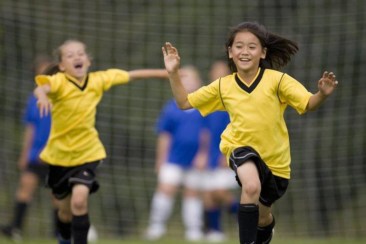 girls playing football