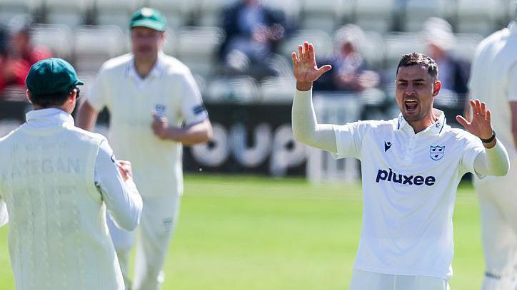 Beyers Swanepoel celebrates taking a wicket for Worcestershire