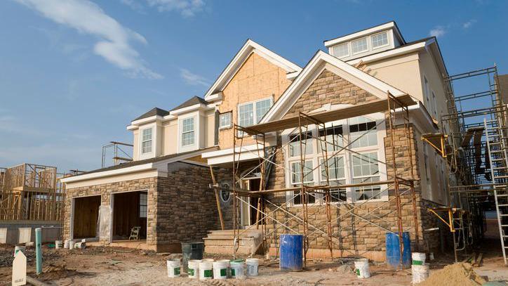 House surrounded by scaffolding