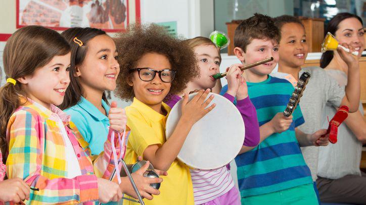 Children taking part in a music lesson.