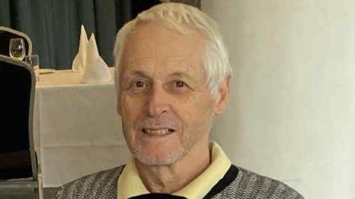 Steven Jackson from Ramsgate sat at home in grey jumper with yellow collar