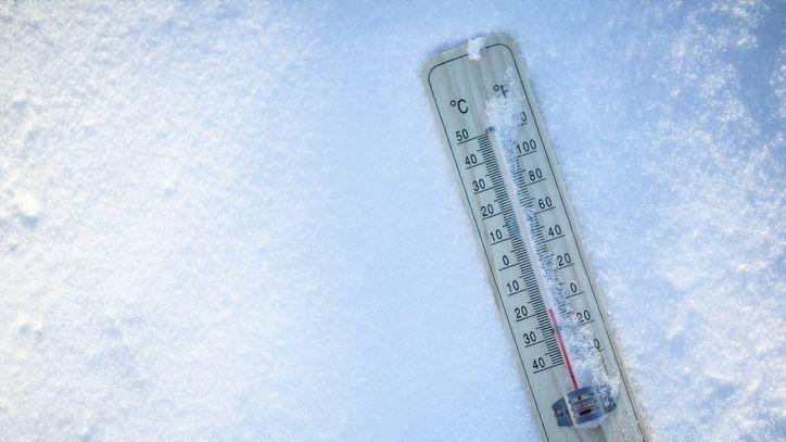 A thermometer in the snow.