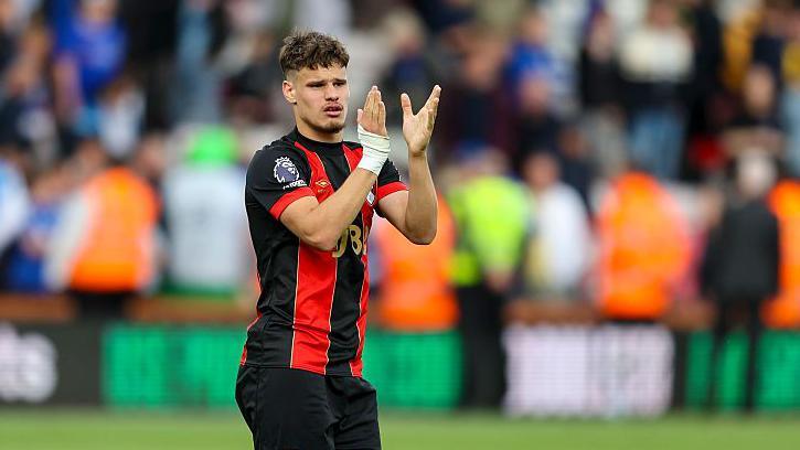 Bournemouth defender Milos Kerkez applauds Cherries fans