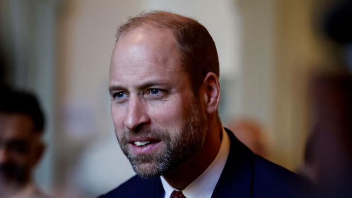 Prince William in suit and tie