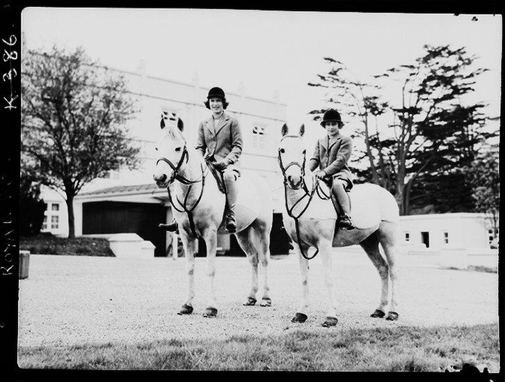 Princess Elizabeth and Margaret on horses