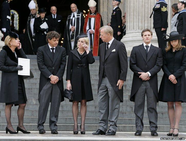 Members of Margaret Thatcher's family (left-right) Daughter Carol Thatcher and partner Marco Grass, Sarah Thatcher, wife of son Mark Thatcher, and grandchildren Michael and Amanda Thatcher