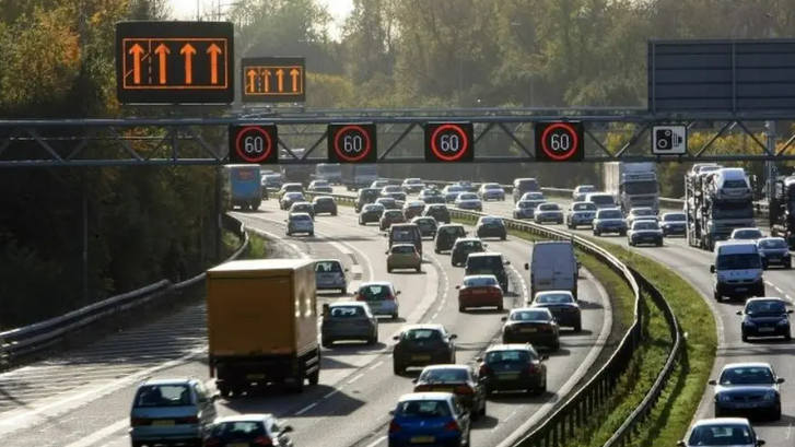 a smart motorway with 60mph signs above 