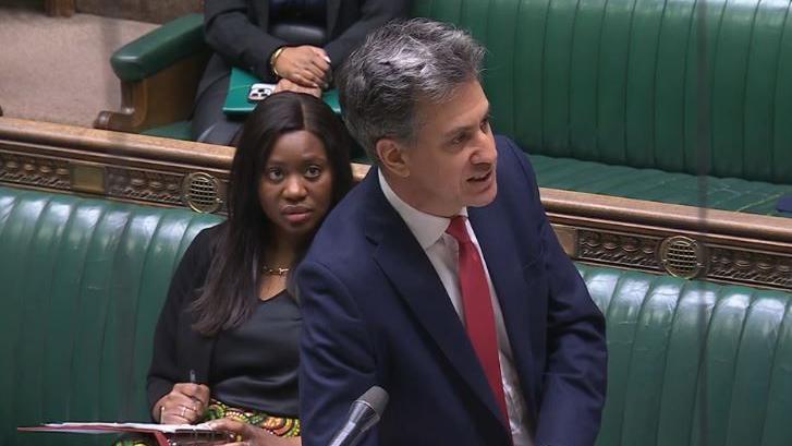 Picture of Ed Miliband speaking on the green benches of the House of Commons. 