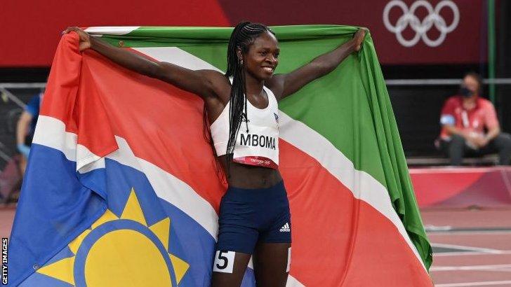 Christine Mboma with the Namibian flag