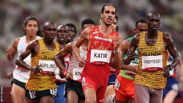 Uganda's Joshua Cheptegei (right) and his compatriot Jacob Kiplimo (left) in action that the Tokyo Olympics