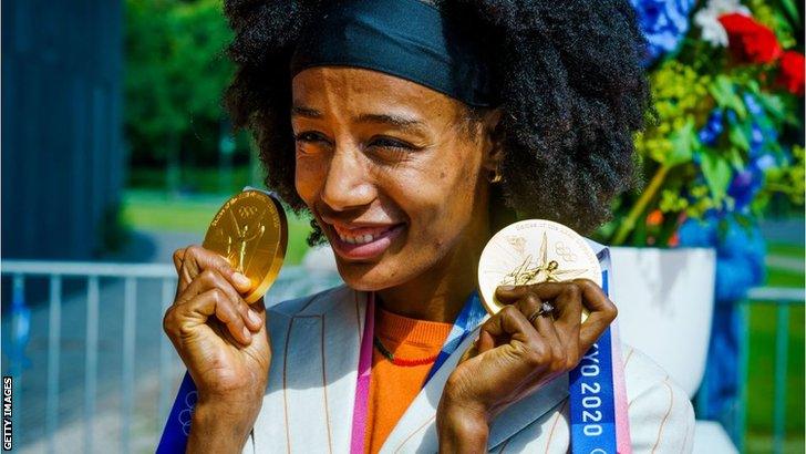 Ethiopian-born Dutch athlete Sifan Hassan with her two gold medals from the Tokyo Olympics