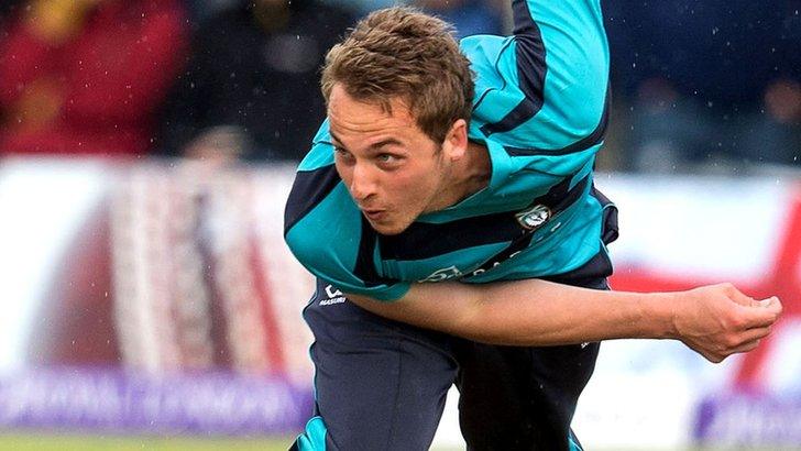 Scotland bowler Josh Davey in action