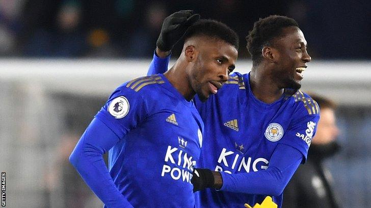 Nigeria team-mates Kelechi Iheanacho (left) and Wilfred Ndidi celebrate a goal for Leicester City