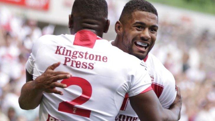 Jermaine McGillvary and Kallum Watkins celebrate an England try