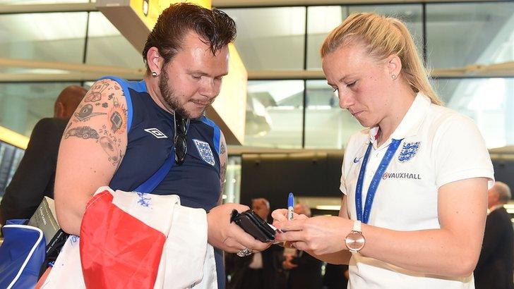 Laura Bassett (right)