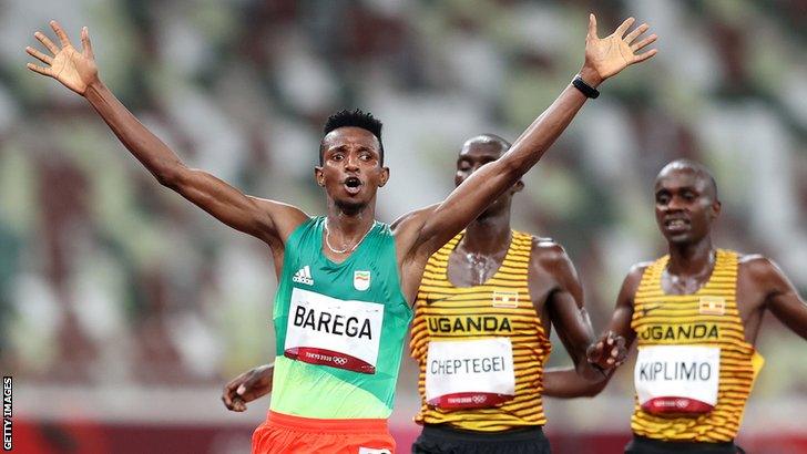 Ethiopia's Selemon Brega celebrates winning the Olympic 10,000m gold medal at Tokyo 2020