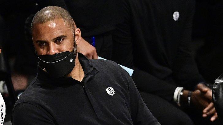 Ime Udoka wearing a face covering during the Covid-19 pandemic when he was an assistant coach with the Brooklyn Nets