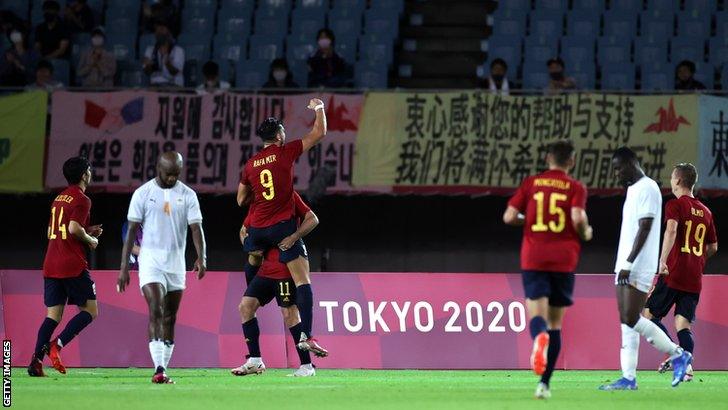 Spain celebrate their fifth goal against Ivory Coast in the quarter-finals of the men's football at the Tokyo Olympics