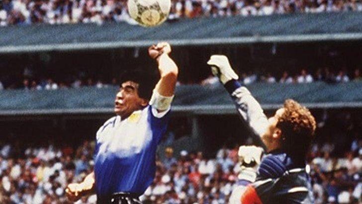 Maradona punches the ball past Peter Shilton