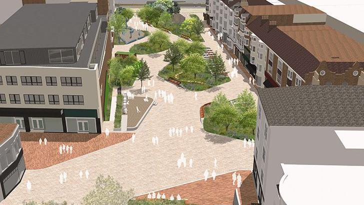 This shows a slightly overhead view of the new proposed area being built, with multiple white figures representing people dispersed across the town. There are sections of greenery that can be seen along the path, and on both sides of the walkway there are are buildings.