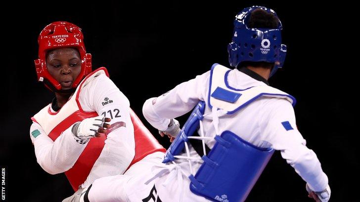 Ivory Coast's Aminata Traore (left) during her bronze medal fight against Althea Laurin in the women's +67kg taekwondo