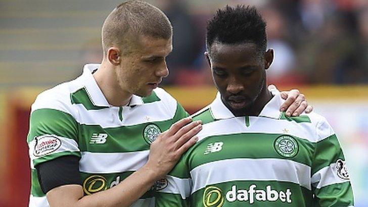 Celtic's Jozo Simunovic and Moussa Dembele