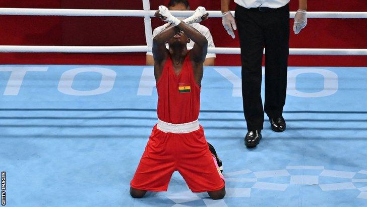 Ghanaian boxer Samuel Takyi celebrates a win at the Tokyo Olympics