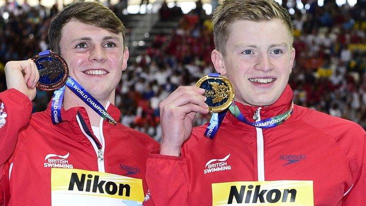 Adam Peaty (right) with bronze medallist Ross Murdoch