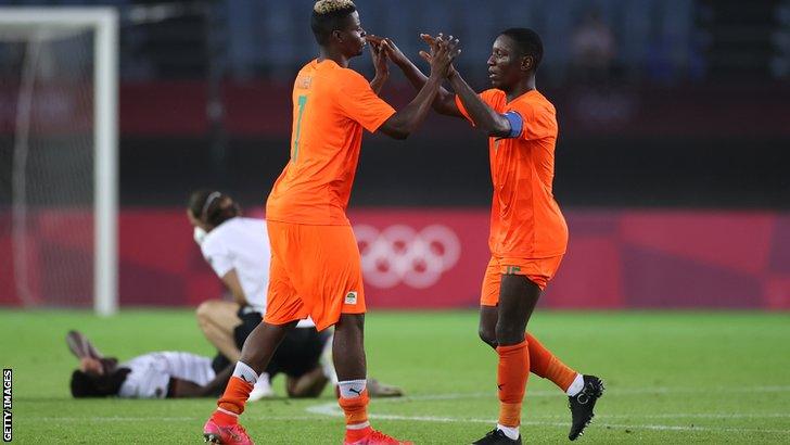 Ivory Coast's Idrissa Doumbia (left) and Max Gradel celebrate reaching the Olympic quarter-finals