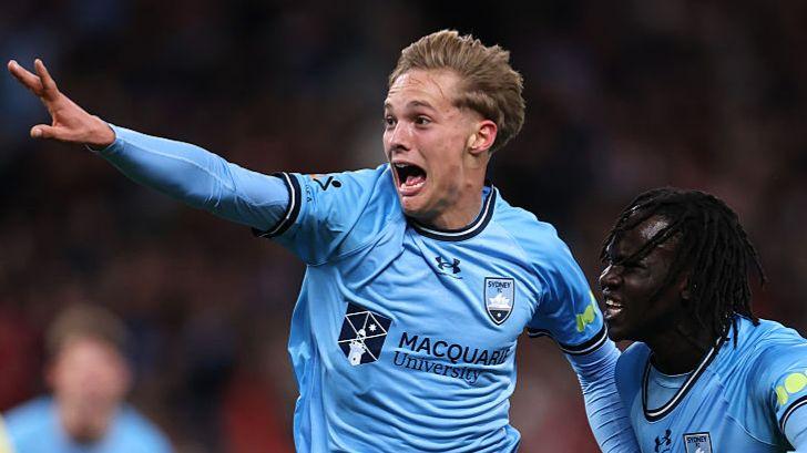 Sydney FC's Joe Lacey celebrates scoring against Wrexham
