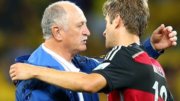 Brazil coach Luiz Felipe Scolari with Thomas Muller of Germany