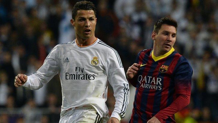 Real Madrid's Cristiano Ronaldo (left) and Barcelona's Lionel Messi