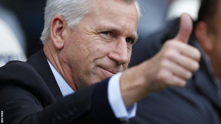 Newcastle United manager Alan Pardew gives a thumbs up during his side's win over Liverpool