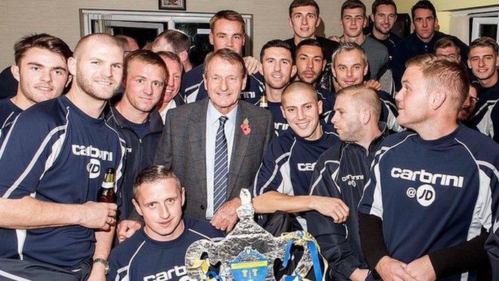 Warrington Town players pictured with England 1966 World Cup winner Roger Hunt, who started his career at the club