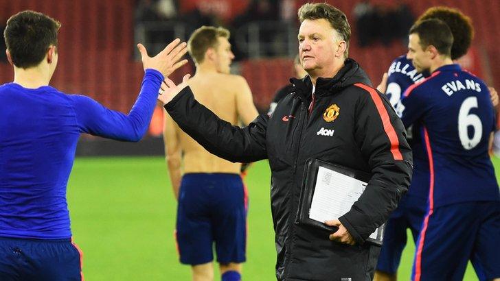 Louis van Gaal congratulates his Man Utd players after the win at Southampton