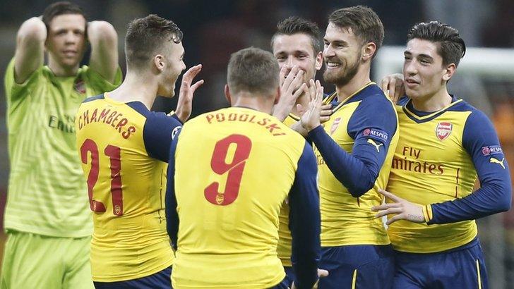 Arsenal players celebrate after Aaron Ramsey's goal