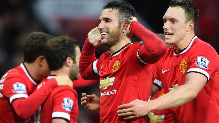 Robin van Persie celebrates Man Utd's third goal with Phil Jones