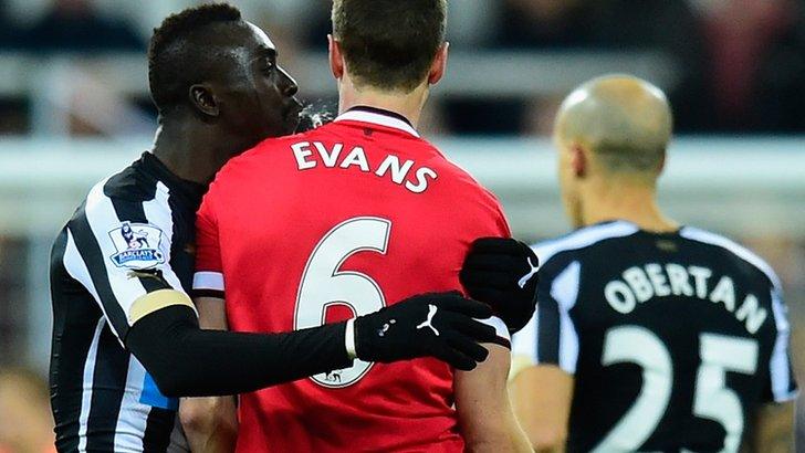 Jonny Evans and Papiss Cisse