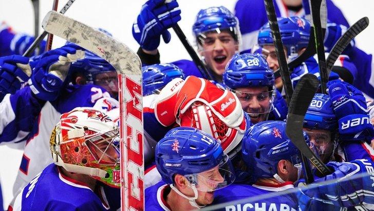 GB ice hockey team celebrate