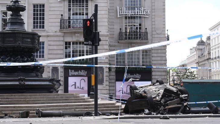 A black car crashed in Piccadilly Circus