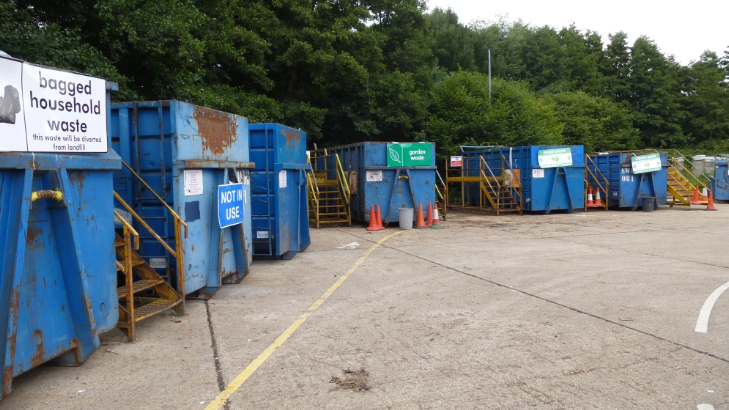 Collection bins at the Bagshot community recycling centre.