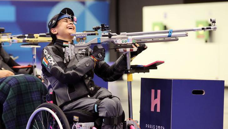 CHATEAUROUX, FRANCE - AUGUST 30: Avani Lekhara of Team India reacts after winning the R2 - Women's 10m Air Rifle Standing SH1 Final on day two of the Paris 2024 Summer Paralympic Games at Chateauroux Shooting Centre on August 30, 2024 in Chateauroux, France. (Photo by Andy Lyons/Getty Images)