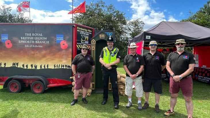 Volunteers from the Royal British Legion with a Humberside Police officer