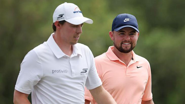 Matt Fitzpatrick and Alex Fitzpatrick smiling while playing in the third round of the Zurich Classic of New Orleans