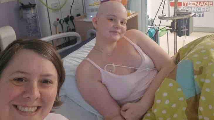 Girl in hospital bed