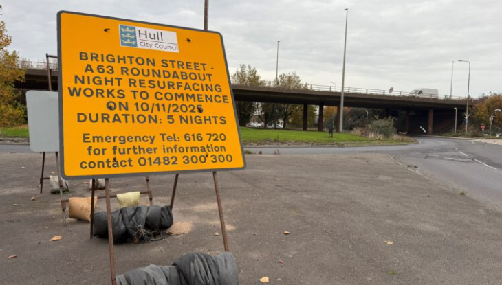A sign on the roundabout under the A63 reads "Brighton Street - A63 roundabout night resurfacing works to commence on 10/11/2025. Duration : 5 nights."